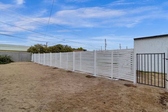 Building Photo - NEW Everything W/ Large Private Fenced yard