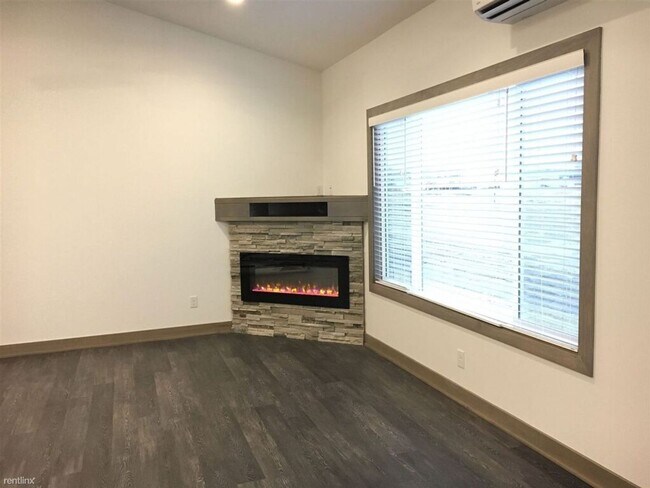 Building Photo - Spacious 4 bedroom/3 bath home with finished lower level and attached 2 car garage
