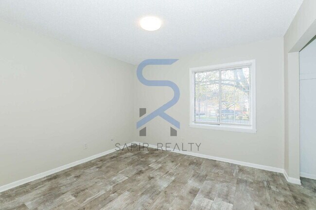 Building Photo - Move-In Ready! Freshly Updated 2BR/1.5BA with All-Electric Living