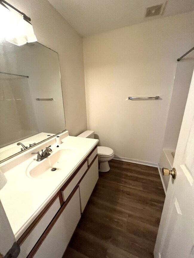 Building Photo - Updated flooring, McClelland Town homes 2BR/2Bath one level patio home, with back court yard! Clo...