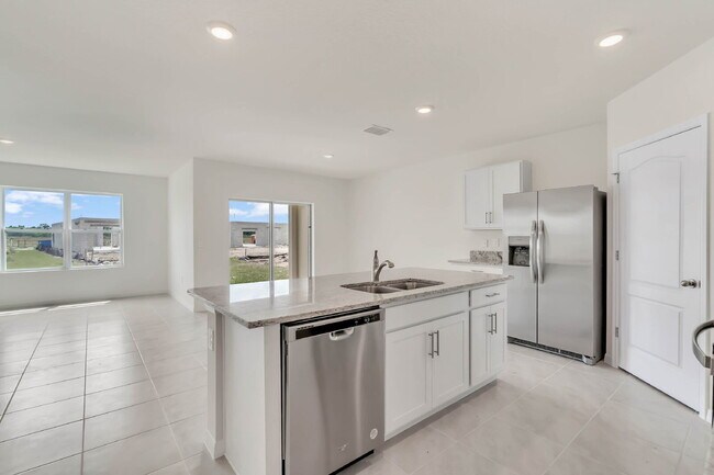 Building Photo - 4 bedrooms and 2 bathrooms, the spacious 1,828 sq ft home features an open concept with a 2 car g...