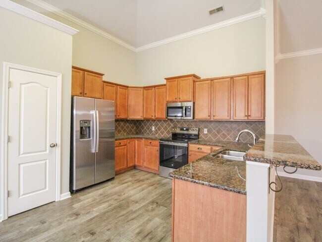 Building Photo - Gorgeous Corner-Lot Home in Canebrake Club – Lawn Care Included