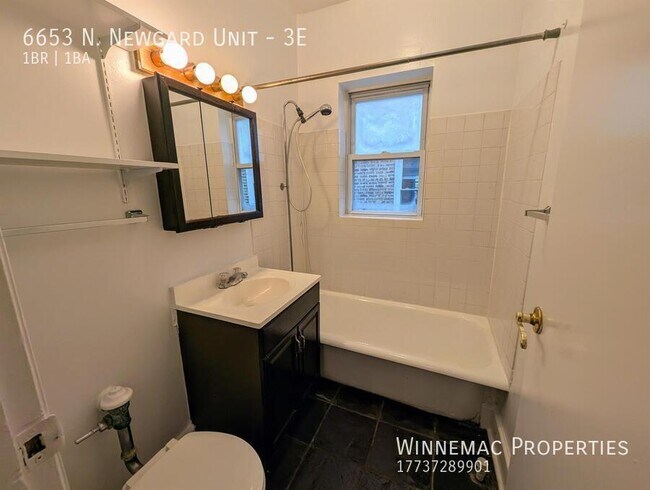 Building Photo - 6653 N Newgard Ave