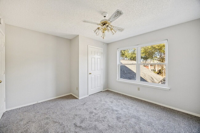 Building Photo - "Spacious 4-Bedroom, 2.5-Bath Living Meets Storybook Backyard Charm!"