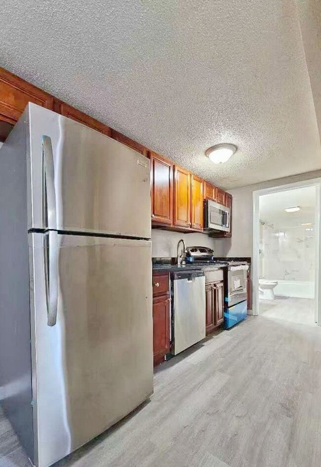 Building Photo - Prime location East Boston modern apartment on 1st floor next to T stop.