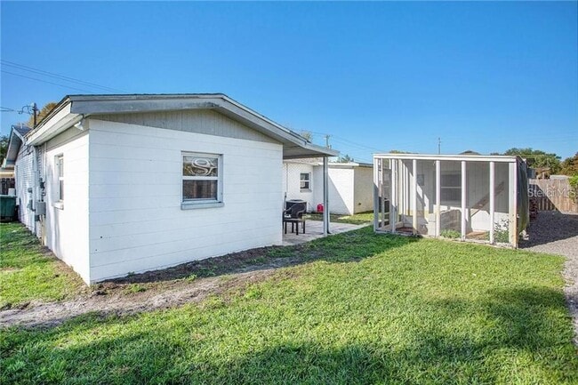 Building Photo - 3209 W Tyson Ave