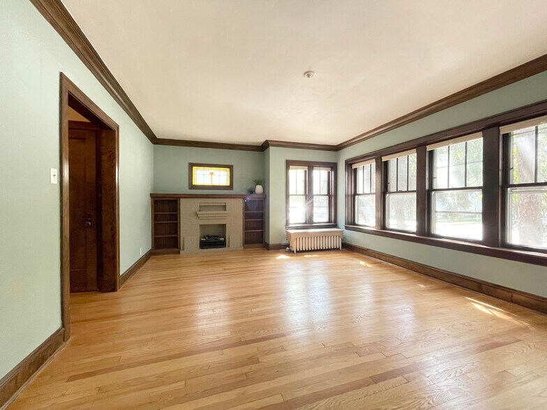 Living Room + Electric Fire Place - 4100 W Newport Ave