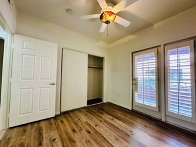 Building Photo - Cozy 1st-floor condo unit with 2 bedrooms and 2 bathrooms. Located in a guard-gated community in ...