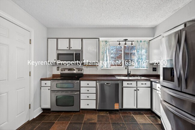 Building Photo - Spacious 4BR Home with Finished Basement in St. Peters