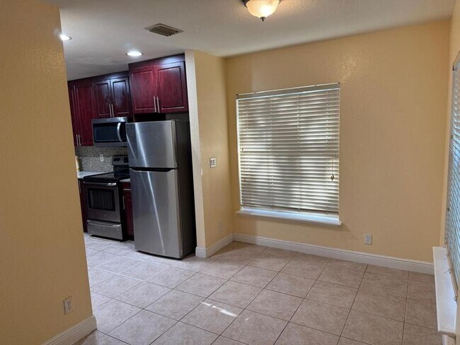 Building Photo - 9981 SW 26th Ct