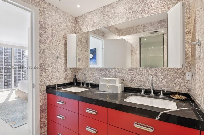 Building Photo - 10275 Collins Ave