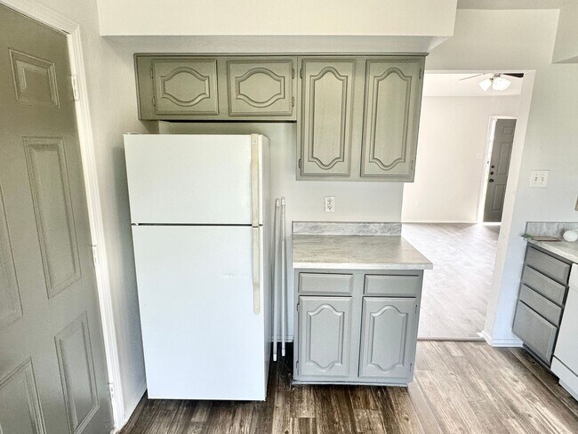 Building Photo - NEW IN MANAGEMENT - AVAILABLE NOW!