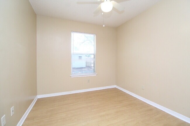 Building Photo - 2BR Home with Wood-Look Flooring, Fenced Backyard & Private Patio