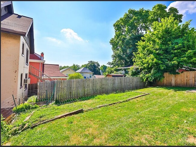Building Photo - Bright 4-Bed Home with Fenced Yard, Central HVAC, and 3 Finished Levels