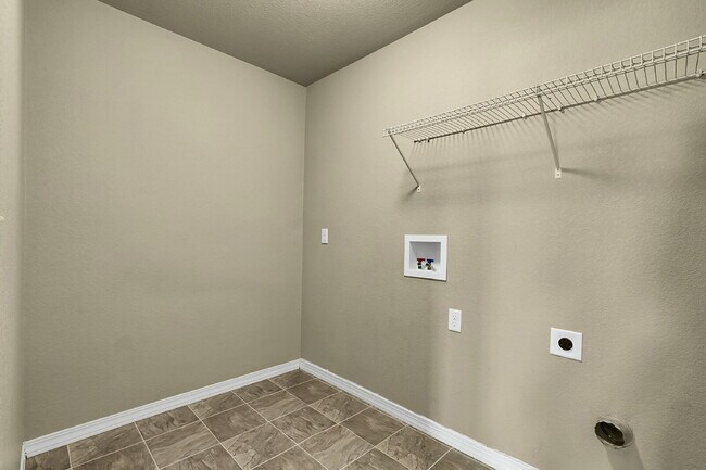 Building Photo - $2,490.95 - 4 Bed, 2.5 Bath Home in CO Springs with Fenced in Yard and 3 Car Garage!