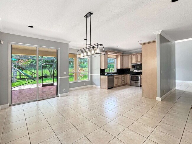 Building Photo - Beautiful 4BR Home in Gated Wellington Shores | Fenced Yard | Resort-Style Amenities