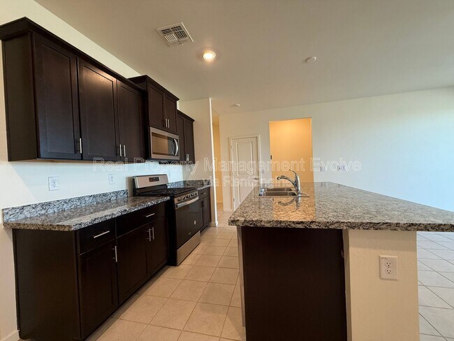 Building Photo - 12538 W Orangewood Ave