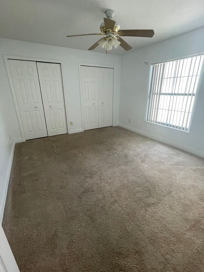 Building Photo - Spacious 4-Bedroom Pool Home – 2 Primary S...