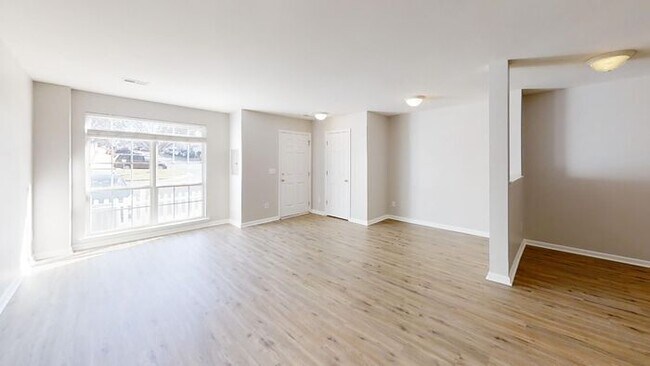 Building Photo - Townhome | Hard Surface Floors Through-Out...