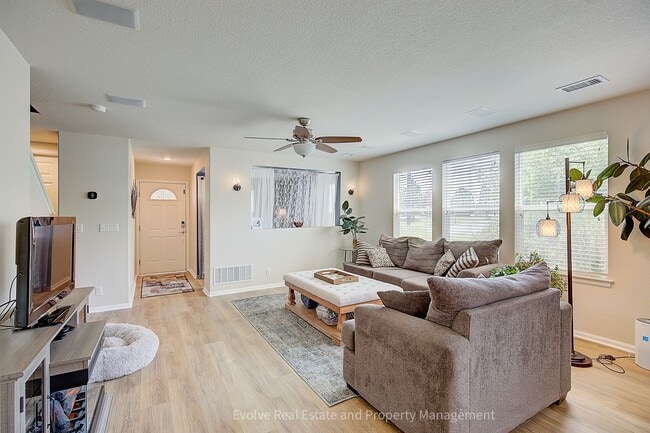 Building Photo - Evolve Real Estate: Beautiful Corner Townhome Available for Move-in on July 21st!