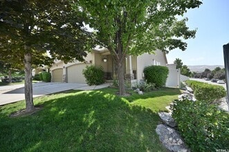 Building Photo - Large 4 bedroom end unit with fully fenced yard is a must see!!
