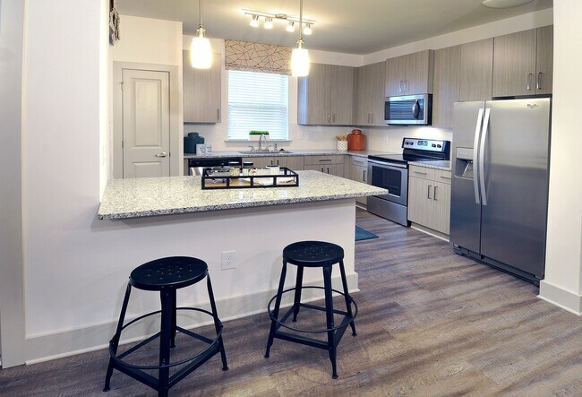 Stunning kitchens include granite countertops and stainless steel appliances - Windsor Sugarloaf