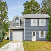 Building Photo - Modern 2-Story Home with Deck & Private Wooded Backyard