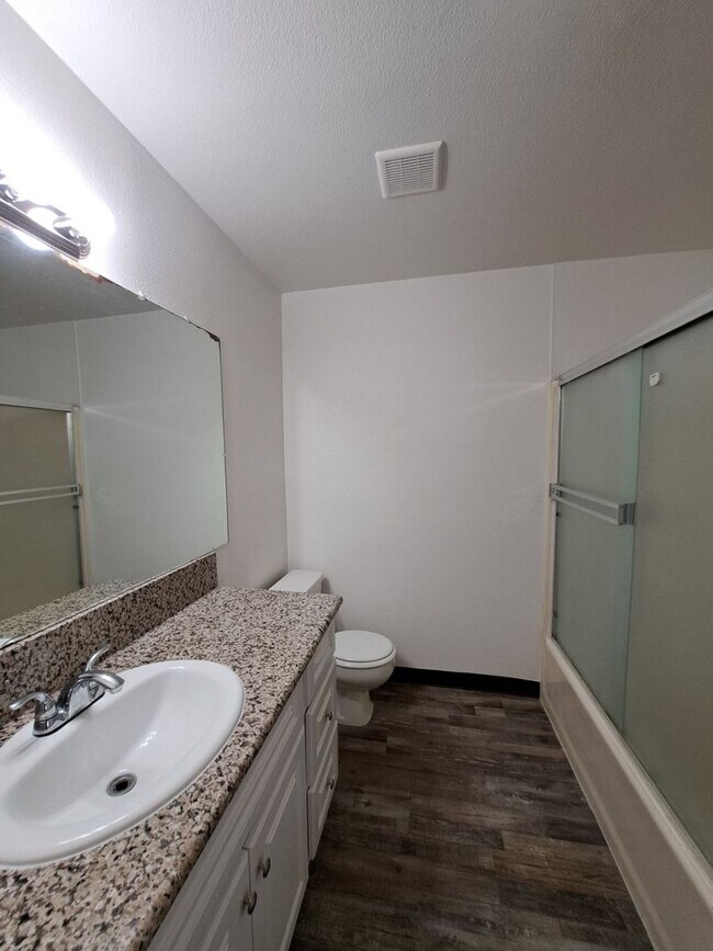 Building Photo - RENT REDUCE & MOVE IN SPECIAL: HALF OFF THE 1ST MONTH'S RENT - Spacious 3-Bedroom Home Steps from...