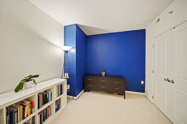 Den can be used as an office/second bedroom. There is also an exterior storage unit! - 851 N Glebe Rd