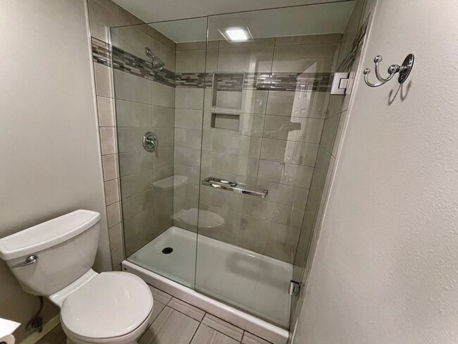 Master bathroom features luxurious walk-in shower - 2525 S Dayton Way
