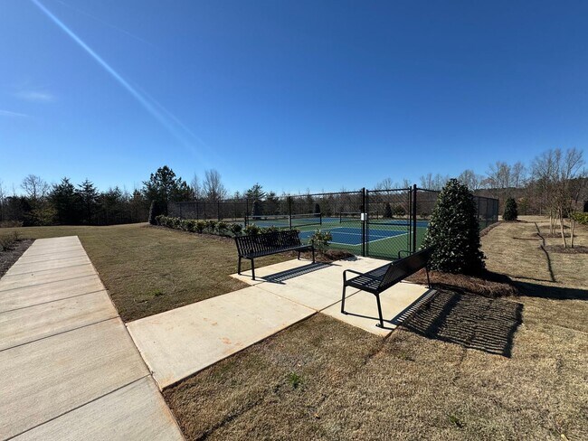 Building Photo - Spacious 1.5-Story 4BR Home with Bonus Room in Active 55+ Community