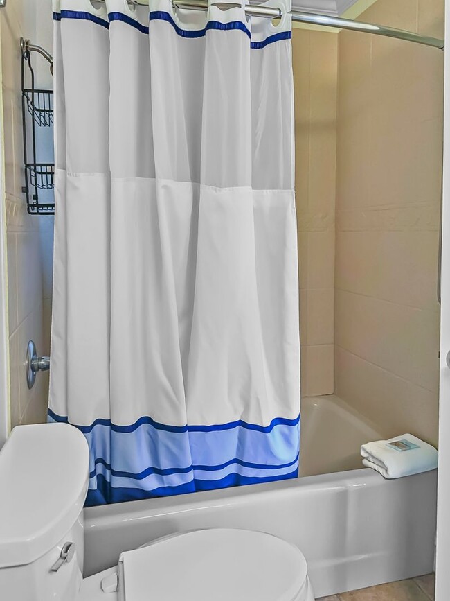 Building Photo - Amazing 3-Bed Condo with HUGE porch on the...