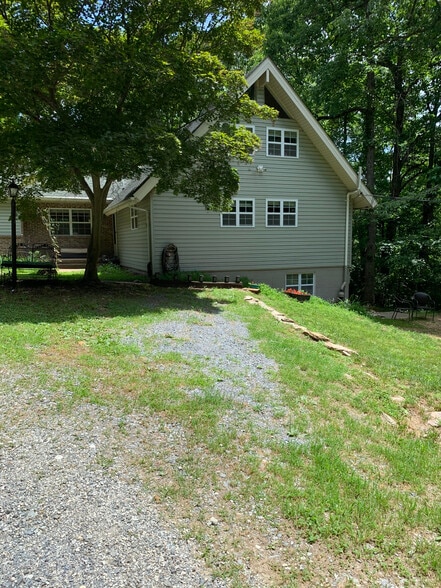 Pull into your new abode, walk down the steps to the right of the house. - 250 Barbara Ln