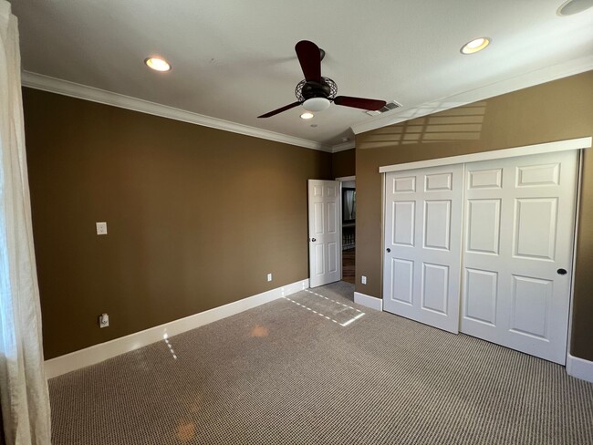 Building Photo - Former model home with tons of upgrades in...