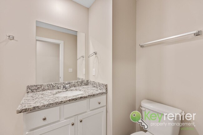 Building Photo - E 69th Ct N Duplex