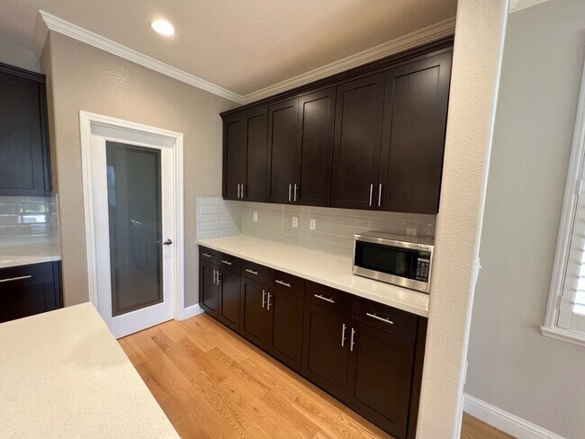 Building Photo - Newer single story home located in desirab...
