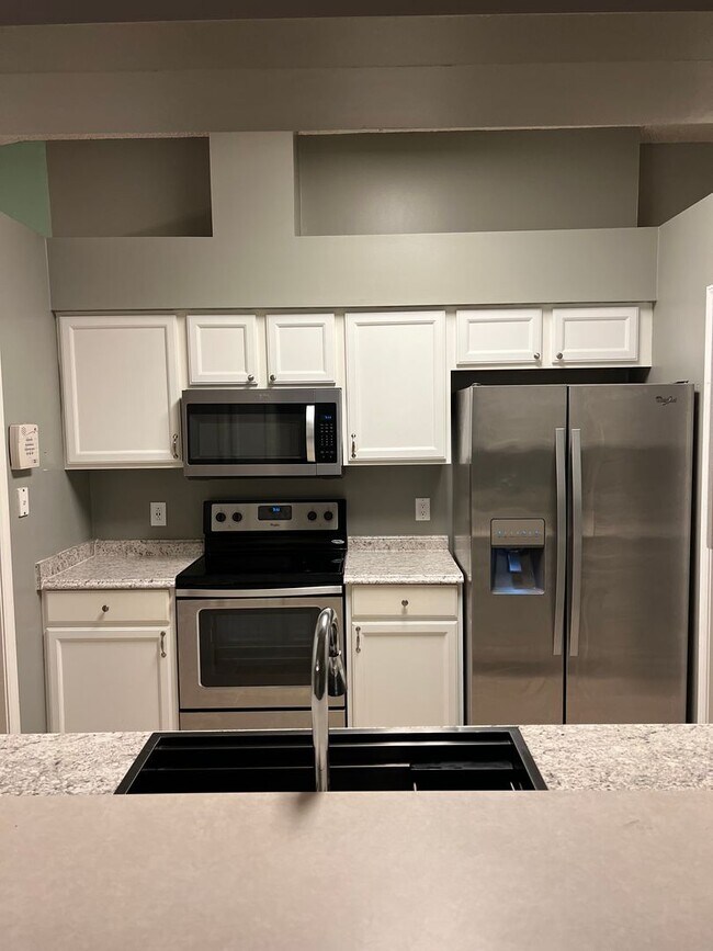 Building Photo - Four bedroom with a fenced in yard!