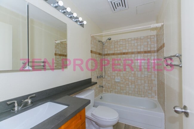Building Photo - a 2 bdrm, 2 bath townhome  with 1 prkg at ...
