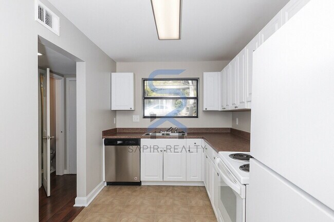 Building Photo - Move in before December 31st and choose your reward: a $250 Amazon Gift Card or a 55 Smart TV!