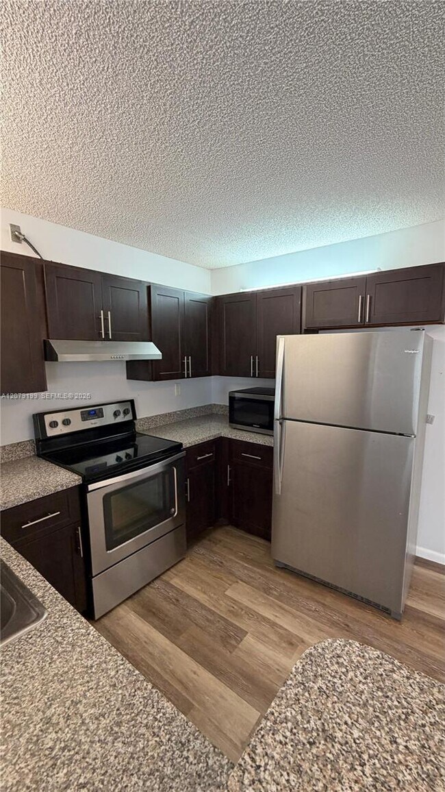 Building Photo - 11641 Royal Palm Blvd