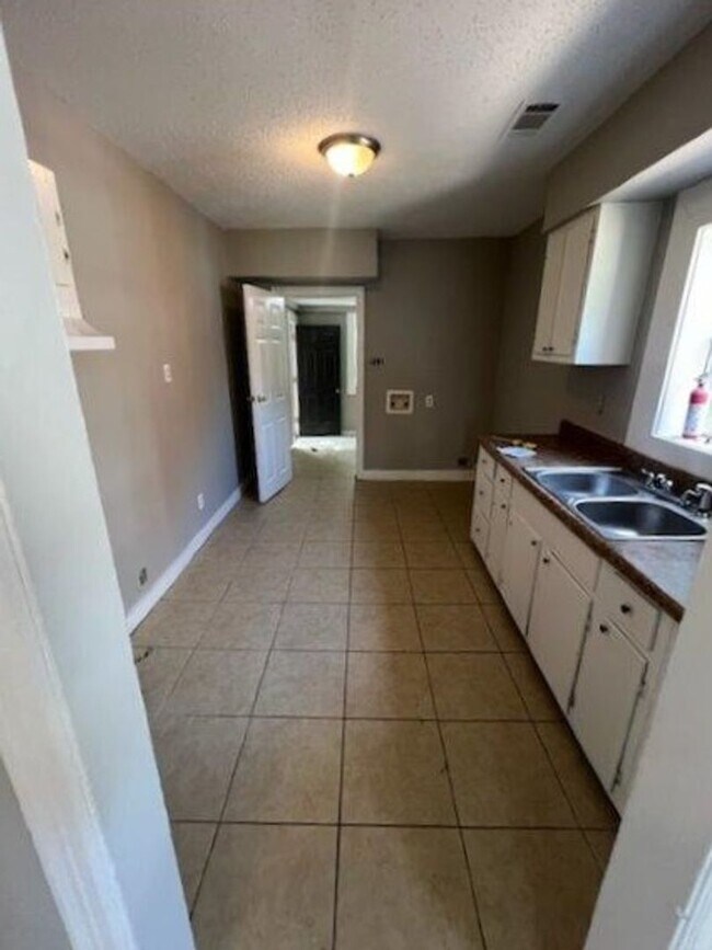 Building Photo - BELOW MARKET RENT!