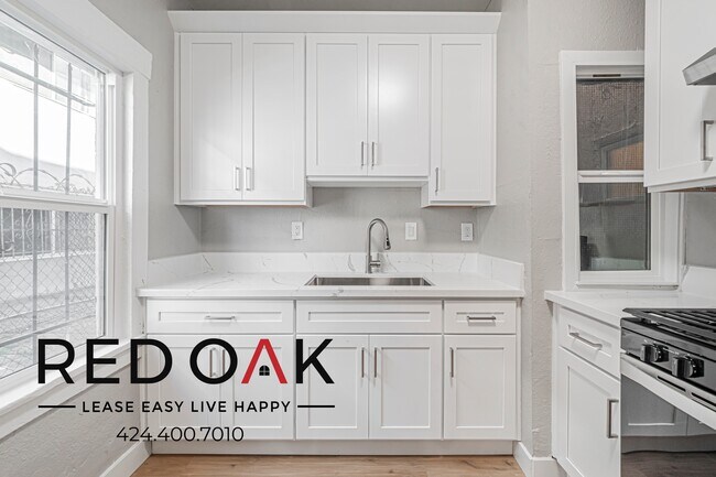 Building Photo - 4606 S Vermont Ave