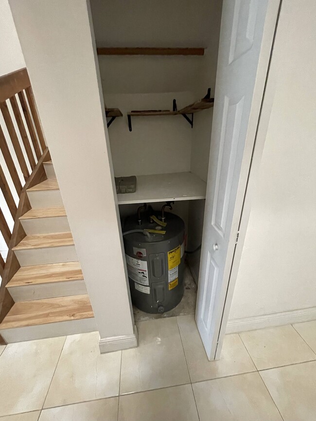 Stairs and Water Heater - 8115 SW 21st Ct