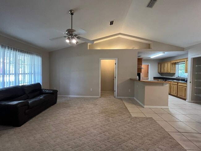 Building Photo - 3BR/2BA Home with 2 Car Garage, Fenced Yard & RV Hookups – Lake City, FL