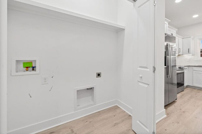 Building Photo - Pet Friendly Three Bedroom with Bonus!