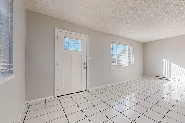 Building Photo - NE Heights - Large 2 Bedroom Apartment with Garage