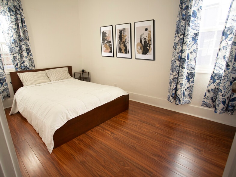 Downstairs bedroom. Please note: The unit will be unfurnished - 1675 West Blvd