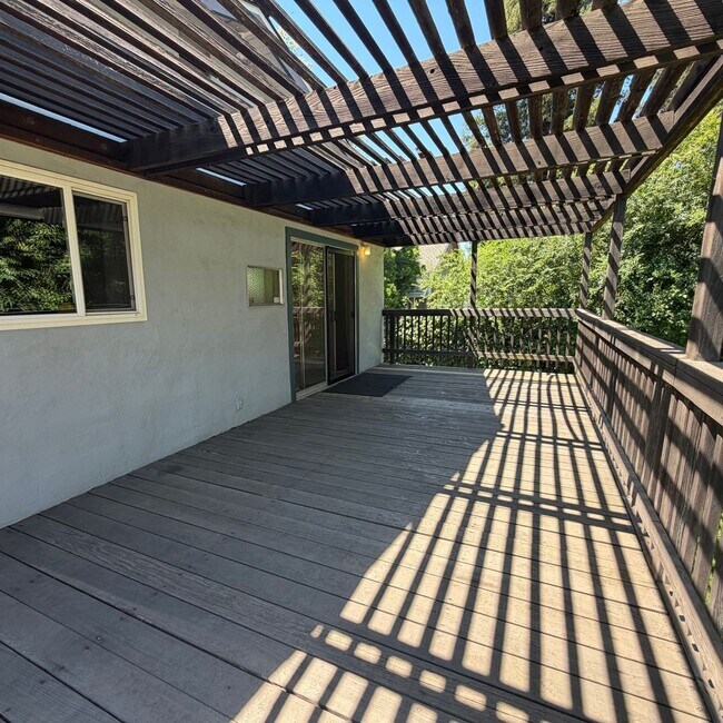 Building Photo - Adorable house with large deck,  yard and RV access