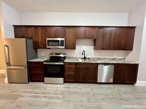 Building Photo - BRAND NEW! 2 Bedroom/1 Bathroom Unit For Lease in Delavan, Illinois