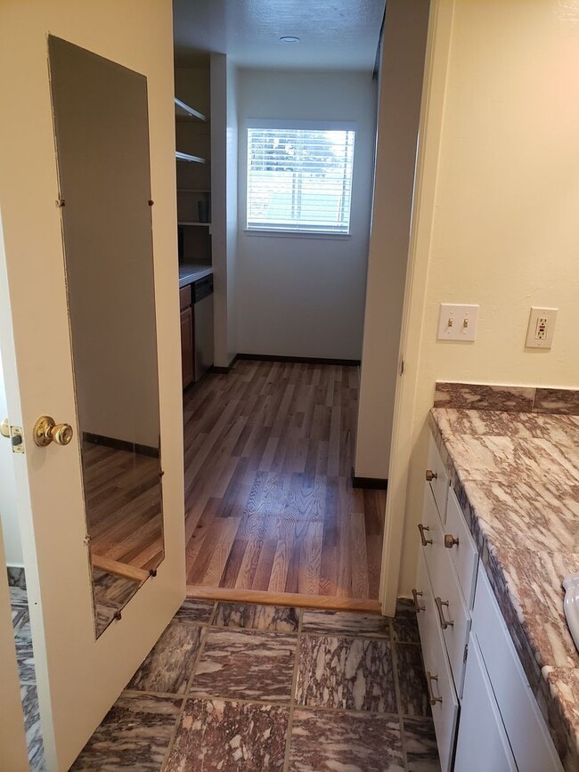 Building Photo - Bright Upstairs Studio with Deck & Peek of the Ocean | Utilities Included